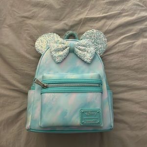 Disney loungefly backpack. Blue with sequin bow and ears